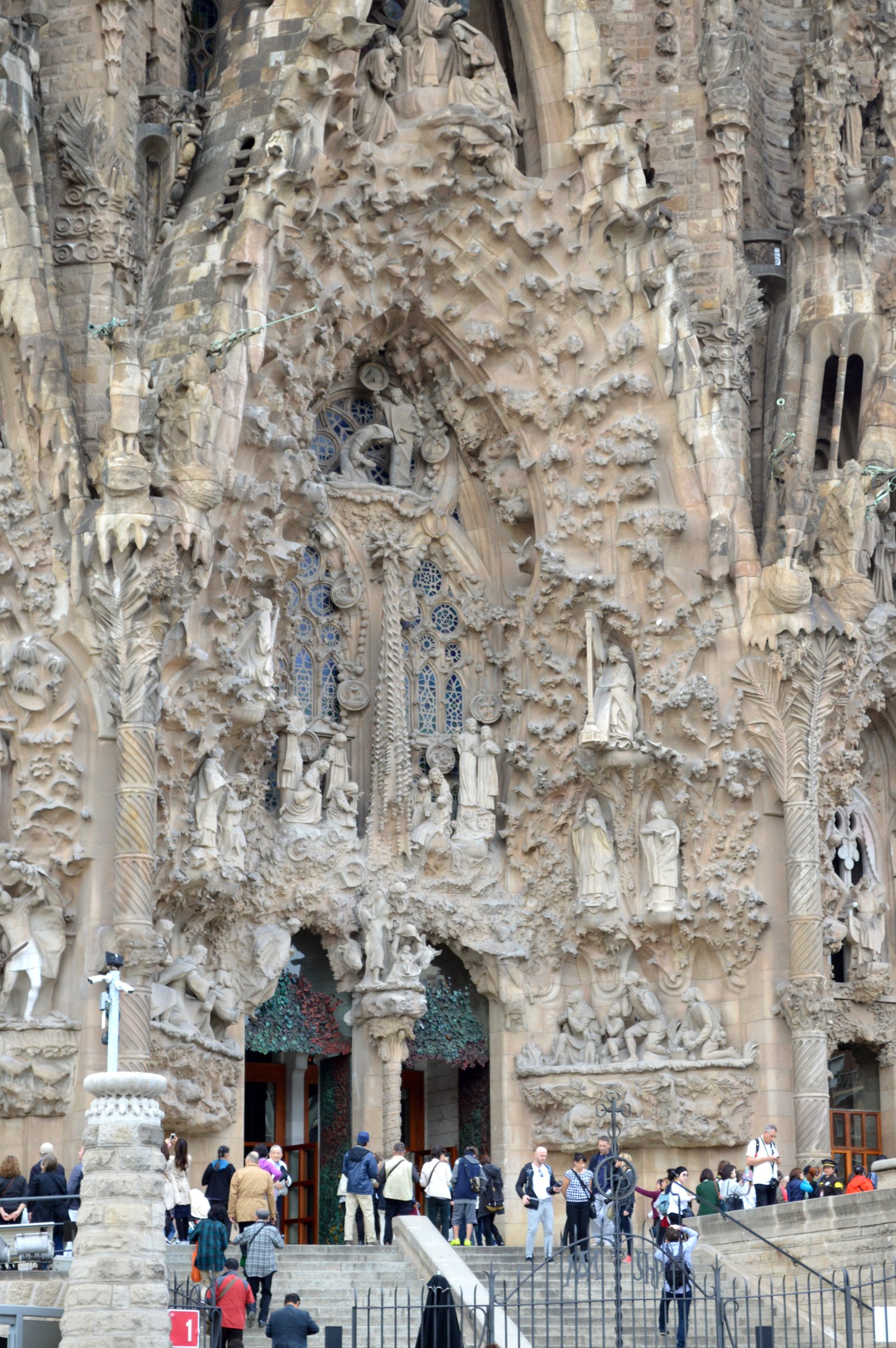 Carved stone detail of the Portal of Charity on the Sagrada Familia's Nativity Facade